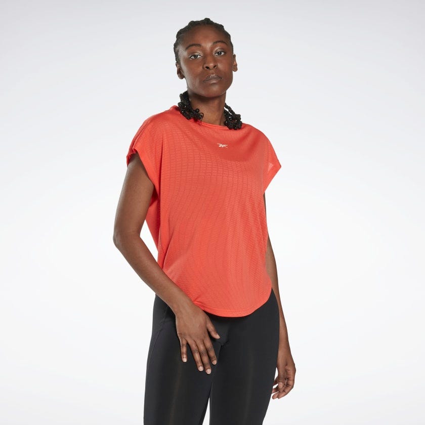 

Reebok United By Fitness Perforated T-Shirt In Semi Orange Flare